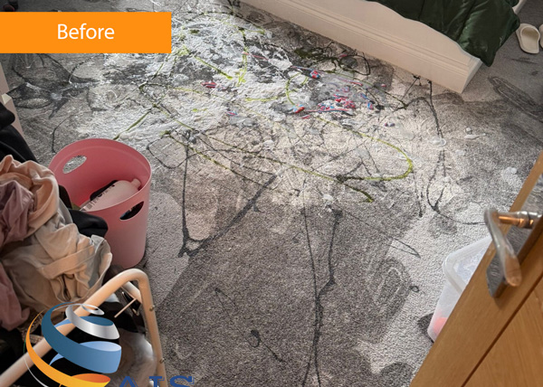 A messy, stained carpet before cleaning